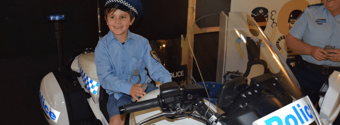 A child wearing our dress-ups (Roadshow 05 Oct 2016)