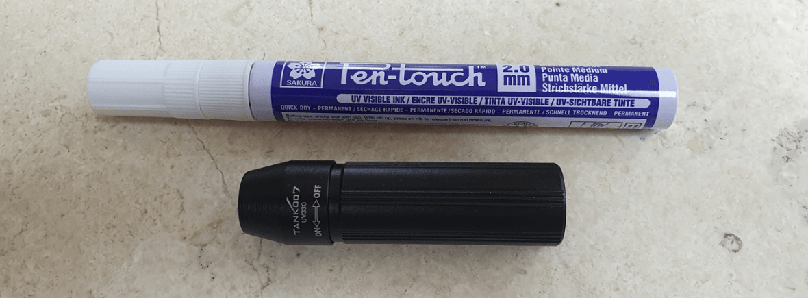 An ultraviolet (UV) pen and black light torch