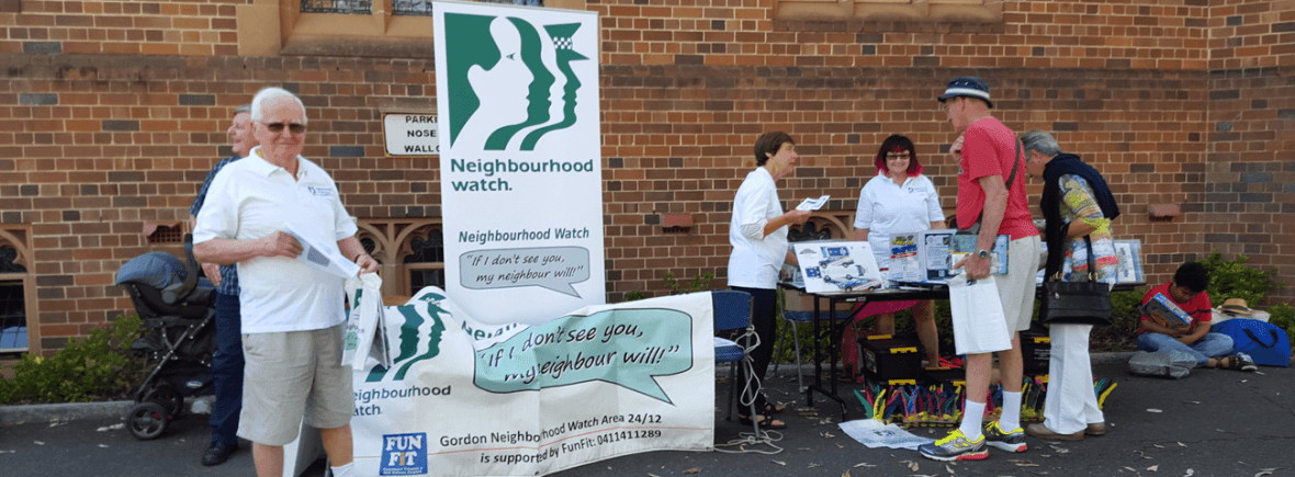 Neighbourhood Watch volunteers on a crime prevention stall at St John's Fete, Gordon.